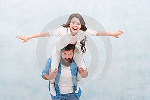 Flight of imagination. Father ride daughter child pretending flying. Happy family have fun together. Playing airplane