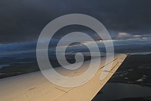 Flight Landing in Hobart in dark cloudy weather