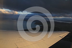 Flight Landing in Hobart in dark cloudy weather