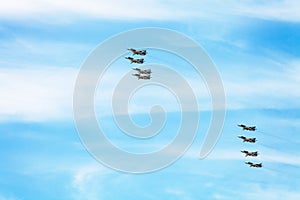 Flight of military battleplane aircrafts in sky