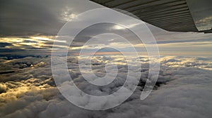 Flight over Alaska between two layers of clouds