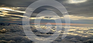 Flight over Alaska between two layers of clouds