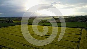 Flight over British countryside with green and yellow fields