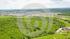 Flight over British countryside with green and yellow fields