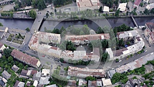 Flight over of the center city, mining town Chiatura famous for its manganese mines being situated on Kvirila river. Evening summe