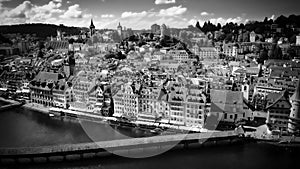 Flight over the city of Lucerne in Switzerland in black and white