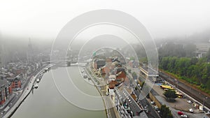 Flight over city on river bank