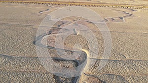 Flight Over Desert Salt Flat Bad Lands - Aerial Drone