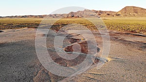 Flight Over Desert Salt Flat Bad Lands - Aerial Drone