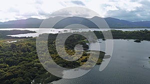 Flight over lakes and forests in Ireland - typical Irish landscape