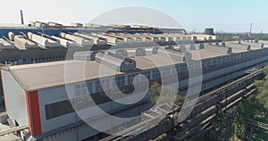 Flight over a large metallurgical plant. Industrial exterior aerial view. Large modern factory