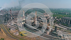 Flight over a large metallurgical plant. Industrial exterior aerial view. Large modern factory