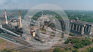 Flight over a large metallurgical plant. Industrial exterior aerial view. Large modern factory