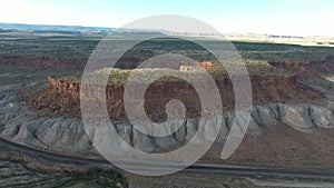 Flight over long highway at monument valley in Utah - Drone Aerial over cars in Arizona. Top view drone footage flying