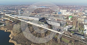 Flight over a modern factory. Span over an industrial zone with modern enterprises.