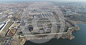 Flight over a modern factory. Span over an industrial zone with modern enterprises.