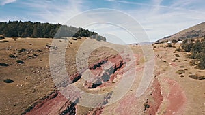 Flight over a mountainous ravine in the Pyrenees with visible rock folds