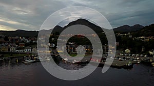 Flight over Norway village during sunset