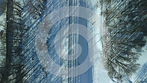 Flight over the railroad. With camera up. Winter industrial landscape. Aerial photography