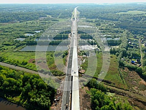 Flight over the river. Passage of hydraulic locks on the channel by commercial cargo ship