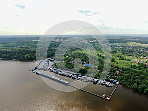 Flight over the river. Passage of hydraulic locks on the channel by commercial cargo ship