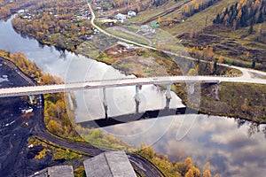 Flight over the road bridge over the river