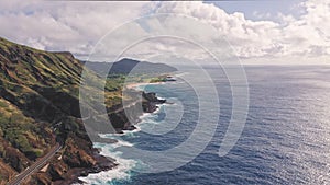Flight over rocky coast of tropical island of Oahu Hawaii. Kalanianaole Highway South Shore Oahu Hawaii Pacific Ocean
