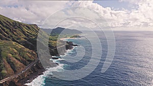 Flight over rocky coast of tropical island of Oahu Hawaii. Kalanianaole Highway South Shore Oahu Hawaii Pacific Ocean