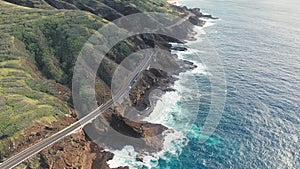 Flight over rocky coast of tropical island of Oahu Hawaii. Kalanianaole Highway South Shore Oahu Hawaii Pacific Ocean