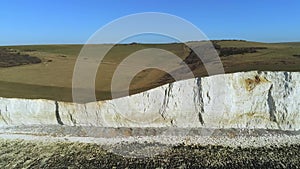 Flight over the white cliffs of Beachy Head and Seven Sisters in England