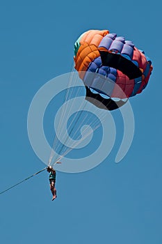 Flight parachute behind boat