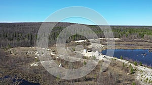 Flight in spring over the tundra of the Yamal Peninsula and the Nenets choom in the North of Siberia