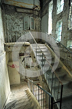 Flight of stairs in an abandoned swimming pool building