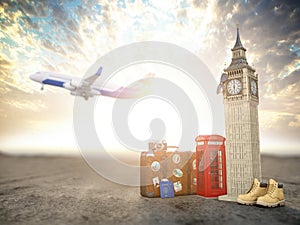 Flight to London, Great Britain.Vintage suiitcase with symbols of UK London, Big Ben and red booth. Travel and tourism concept