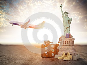 Flight to New York, USA.Vintage suiitcase with symbols of United States Statue of Liberty Travel and tourism concept
