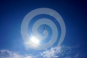 Flighting in the blue sky balloons
