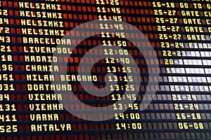 Flights information board in airport terminal