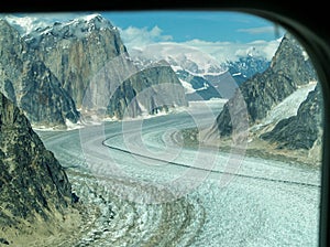 Flightseeing glacier path in Alaska, USA photo