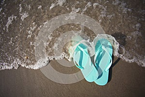 Flip Flop Sandals in the Water at the Beach