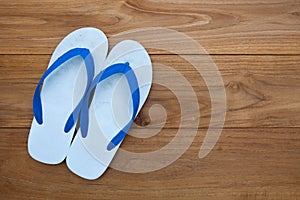 Flip flop sandals on wood