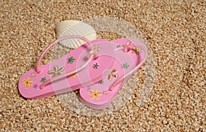 Flip flops on shingle beach