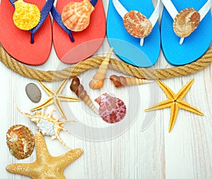 Flip-flops, starfish and seashells.