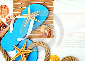 Flip-flops, starfish and seashells.