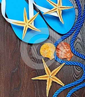 Flip-flops, starfish and seashells.