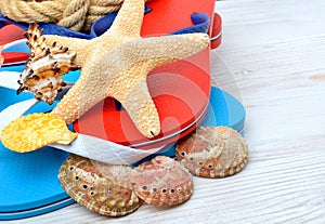 Flip-flops, starfish and seashells.