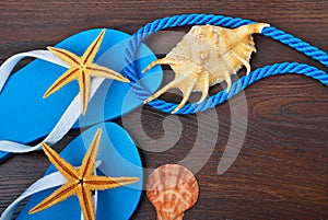 Flip-flops, starfish and seashells.