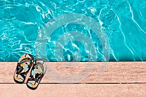 Flip flops and swimming pool
