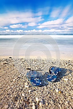 Flip flops on tropical beach