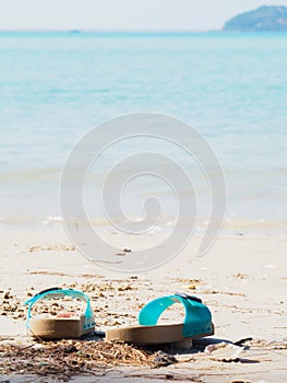 Flipflop on the sand beach