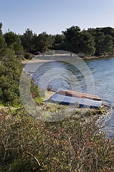 Flipped boat on a coast